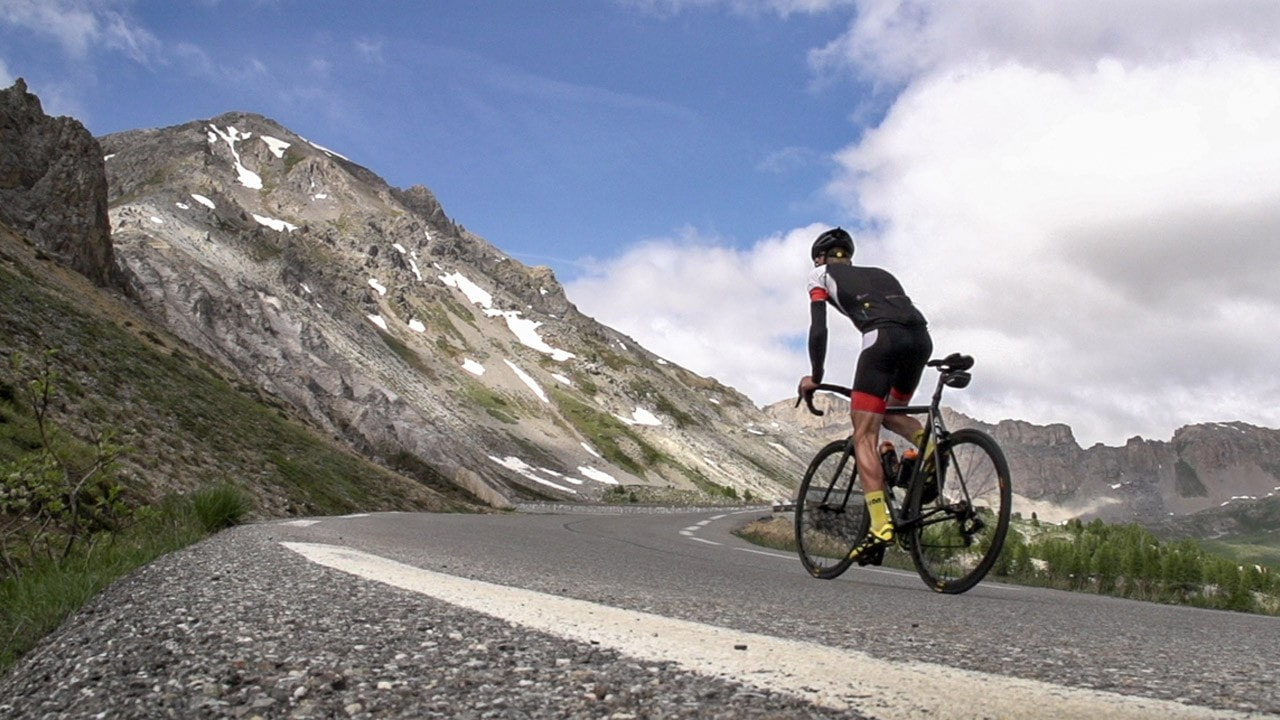 Cyclist climbing Col d'Izoard